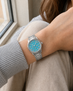 Gucci G-Timeless 32 mm Turquoise Bee Dial Watch YA1265044 worn on wrist