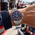 TAG Heuer Formula 1 CAZ101AL.BA0842 worn on wrist in a motorsport paddock