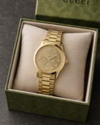Gucci G-Timeless 32 mm Gold Bee Dial Watch YA1265036 presented with packaging