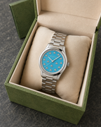 Gucci G-Timeless 32 mm Turquoise Bee Dial Watch YA1265044 presented with packaging
