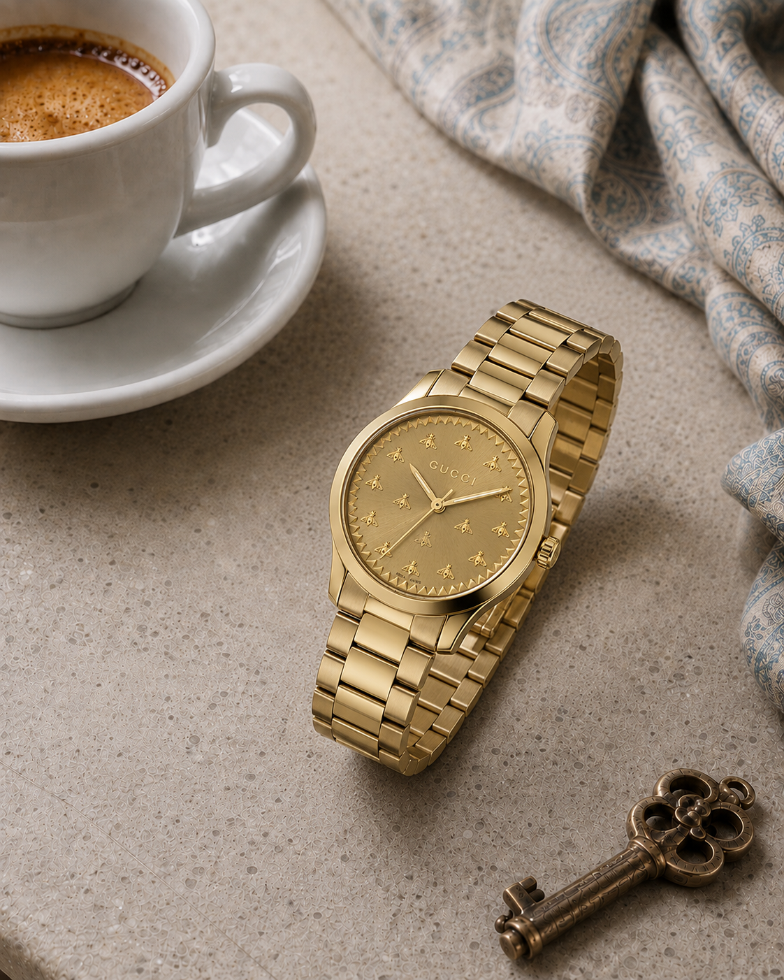 Gucci G-Timeless 32 mm Gold Bee Dial Watch YA1265036 styled in a cafe lifestyle setting