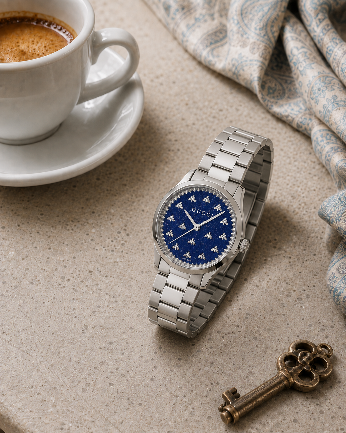 Gucci G-Timeless 32 mm Blue Lapis Bee Dial Watch YA1265043 styled in a cafe lifestyle setting
