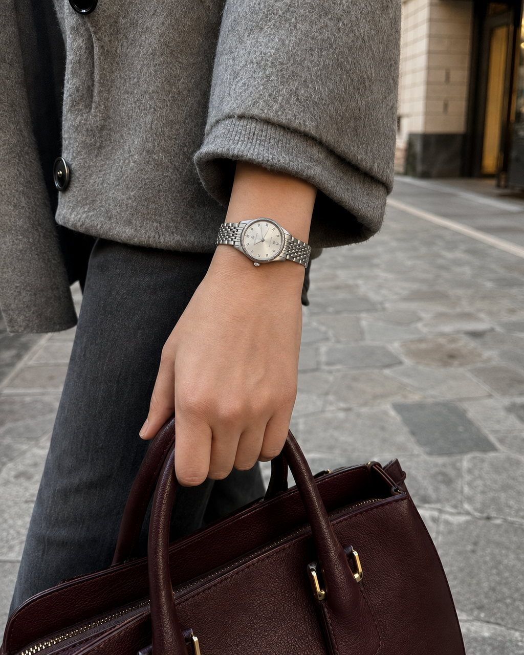 Gucci G-Timeless 29 mm Silver Bee Dial Watch YA1265019 styled in a city lifestyle setting