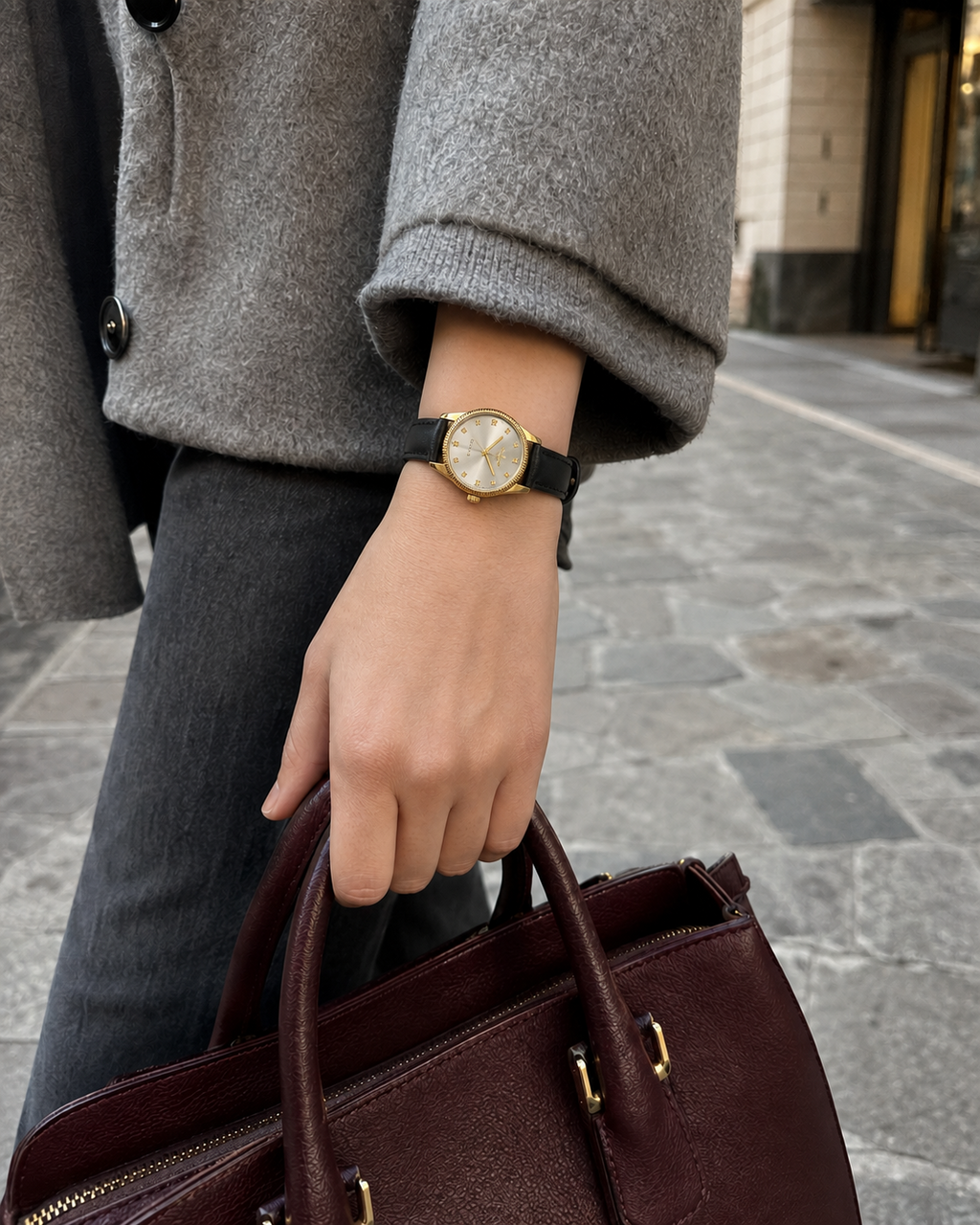 Gucci G-Timeless 29 mm Silver Bee Dial Watch YA1265023 styled in a city lifestyle setting