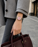 Gucci G-Timeless 29 mm Pink Bee Seconds-Hand Watch YA1265030 styled in a city lifestyle setting