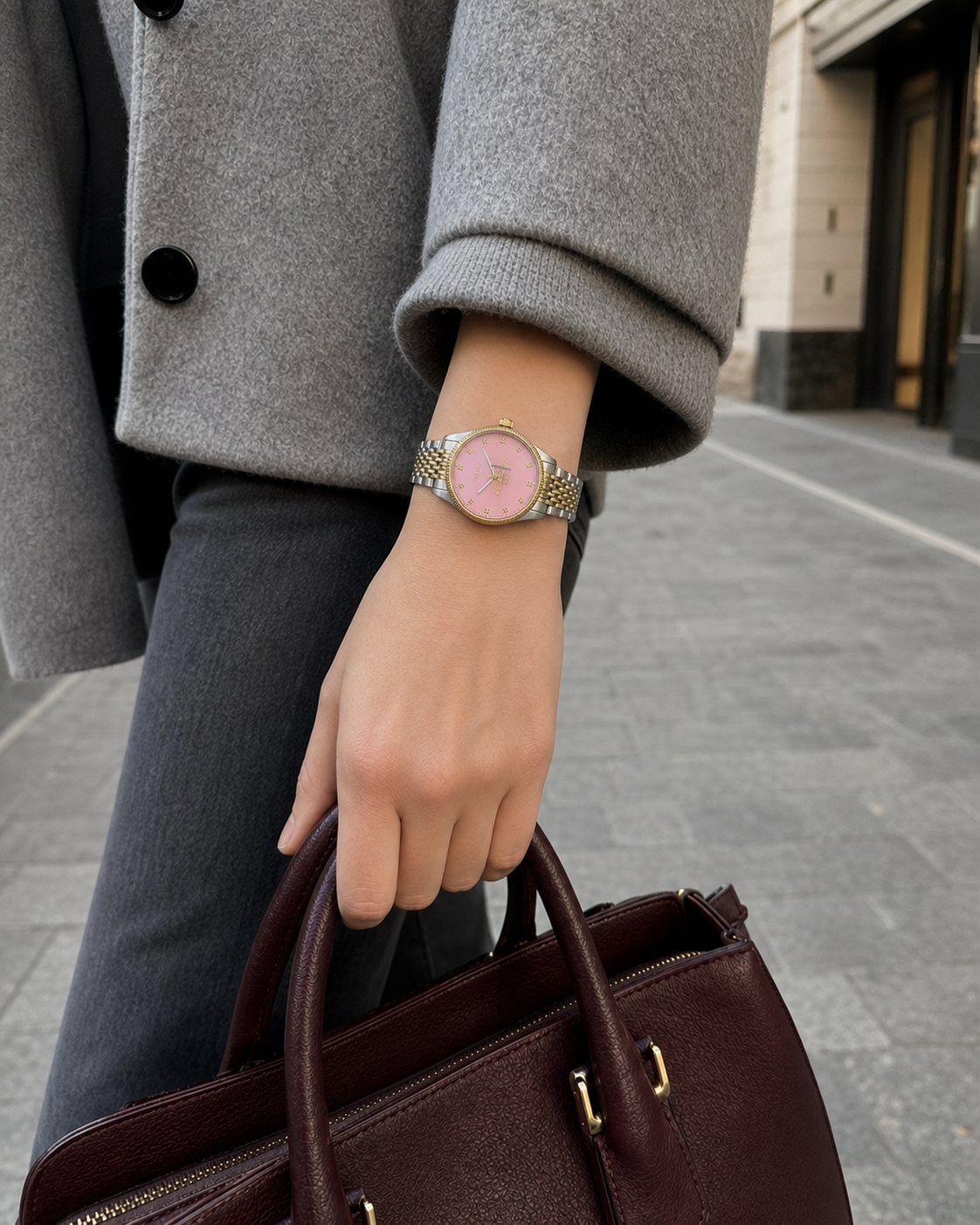 Gucci G-Timeless 29 mm Pink Bee Seconds-Hand Watch YA1265030 styled in a city lifestyle setting