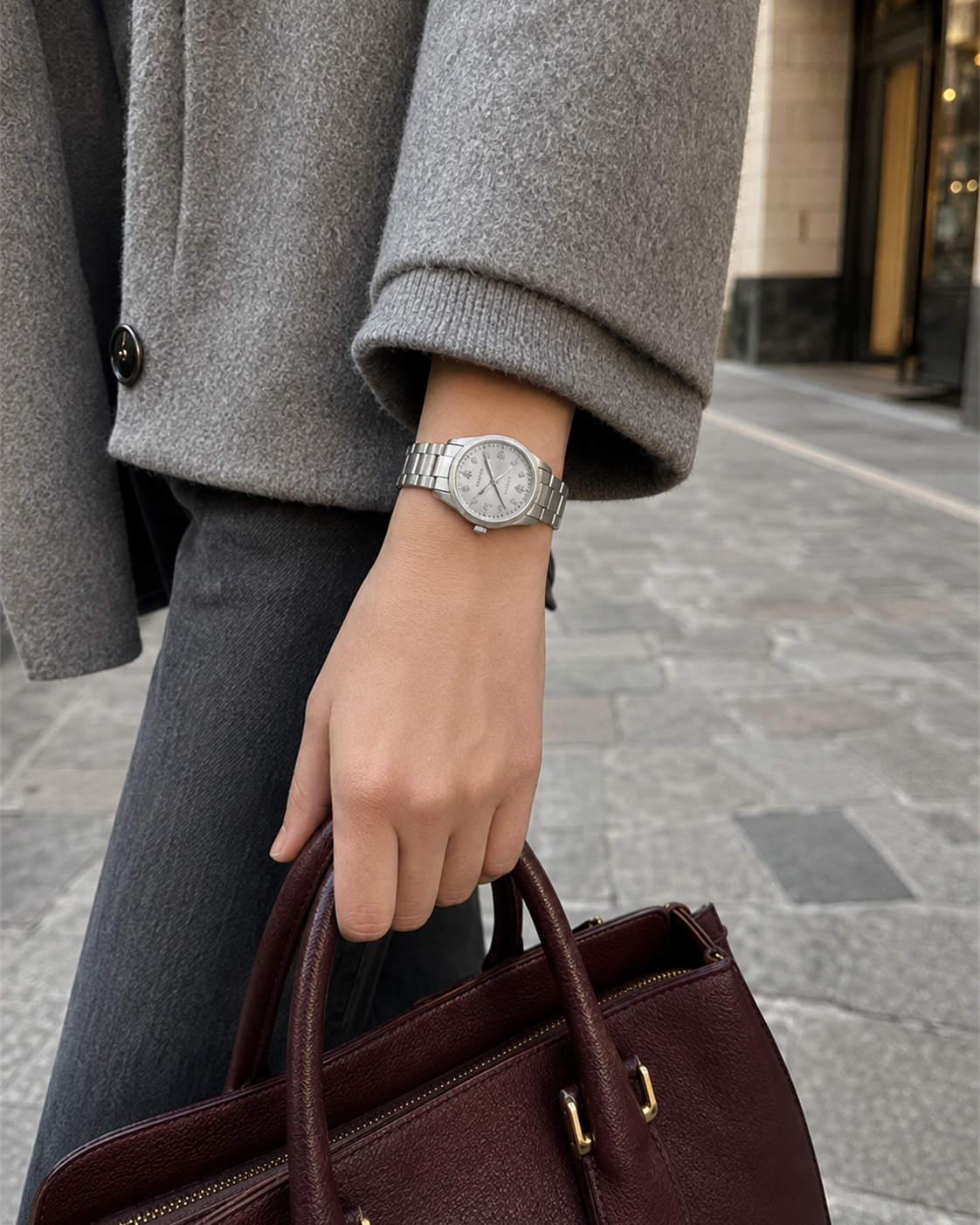Gucci G-Timeless 32 mm Silver Bee Dial Watch YA1265031 styled in a city lifestyle setting