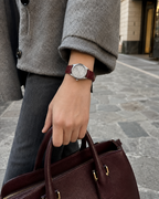 Gucci G-Timeless 32 mm Silver Bee Dial Watch YA1265057 styled in a city lifestyle setting