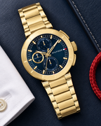 Tommy Hilfiger Lorenzo Men's Multifunction Watch – Navy Dial, Gold Steel Bracelet, 44mm – 1792118 – luxury flat lay