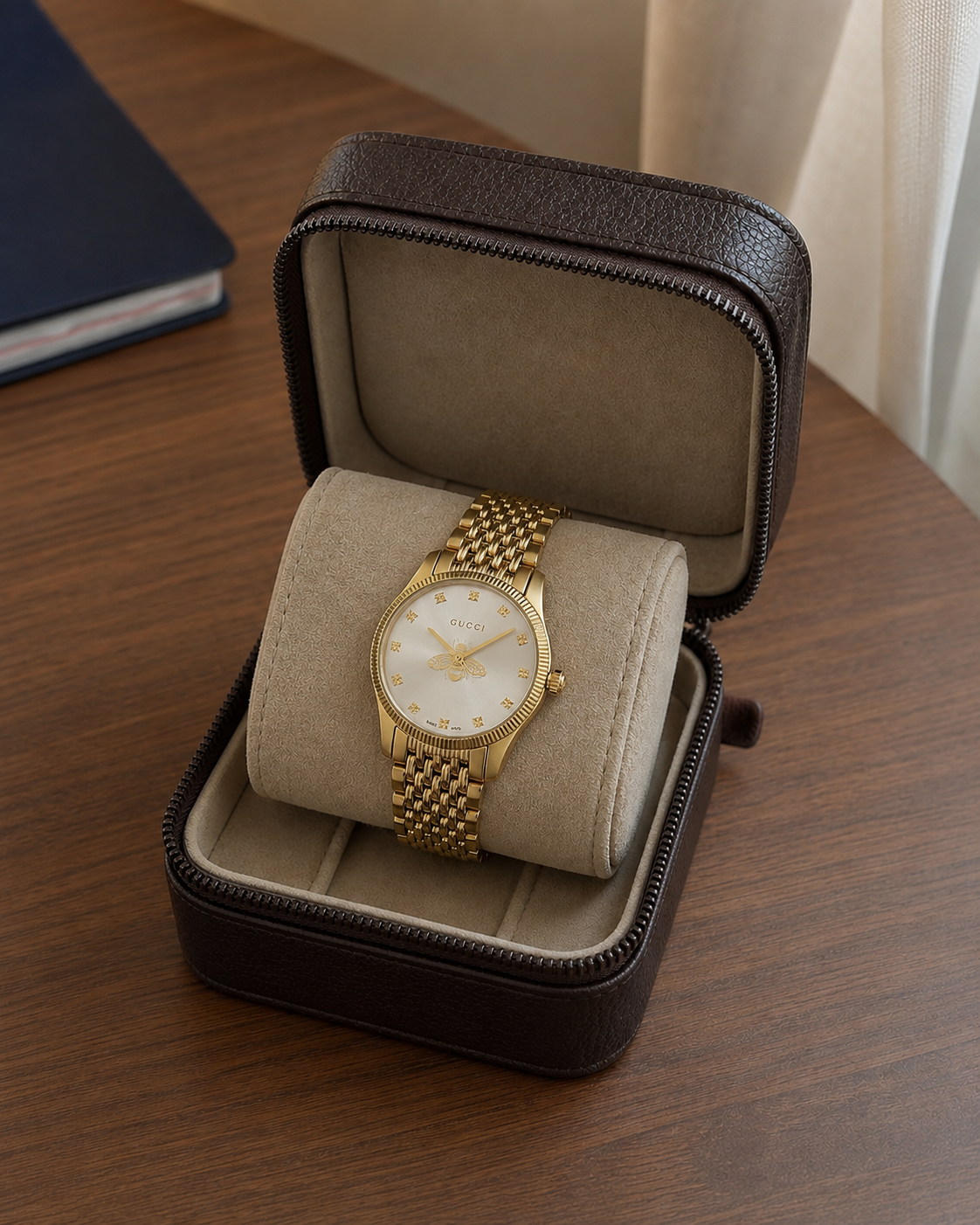 Gucci G-Timeless 29 mm Silver Bee Dial Watch YA1265021 presented in a luxury travel flat lay
