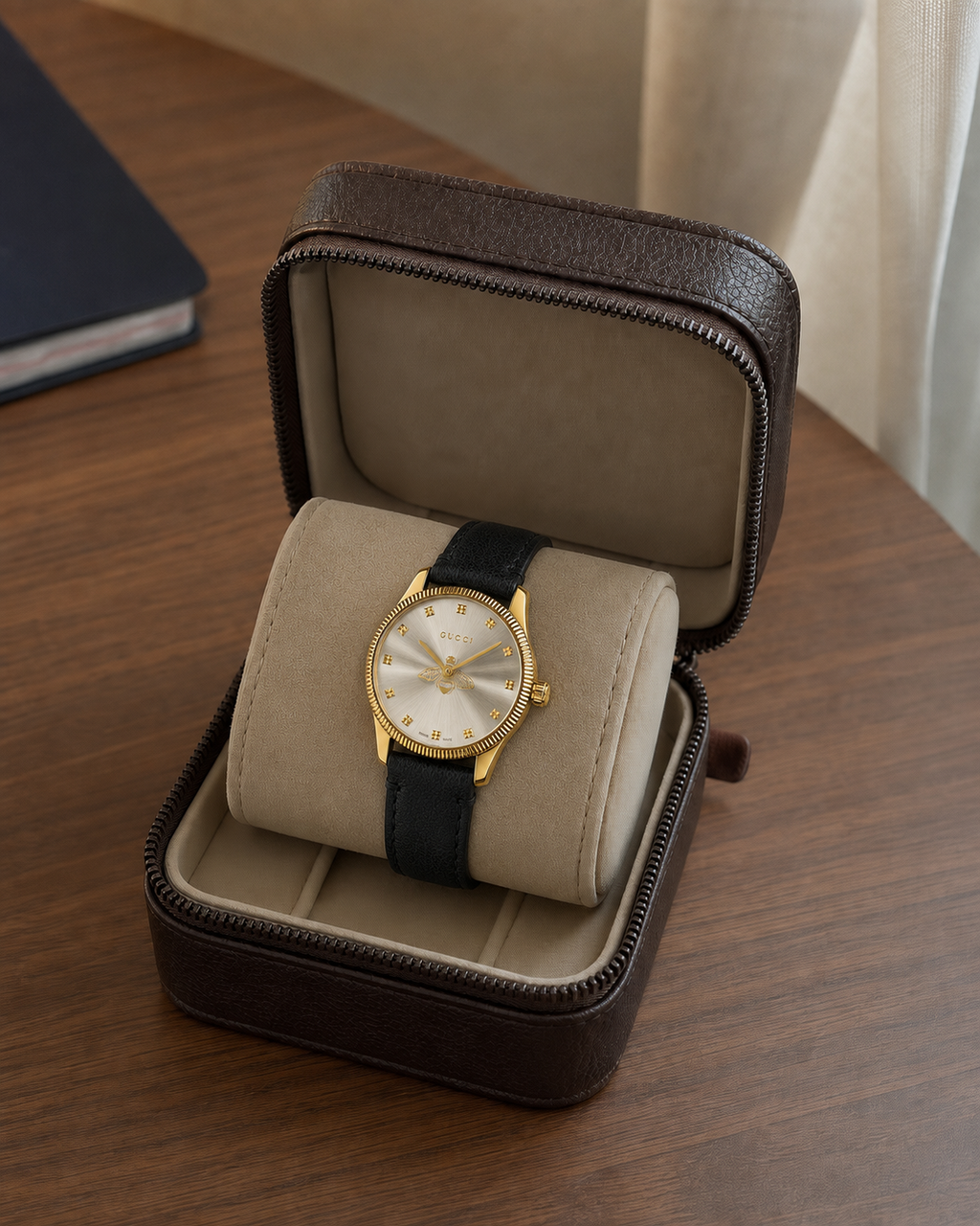 Gucci G-Timeless 29 mm Silver Bee Dial Watch YA1265023 presented in a luxury travel flat lay