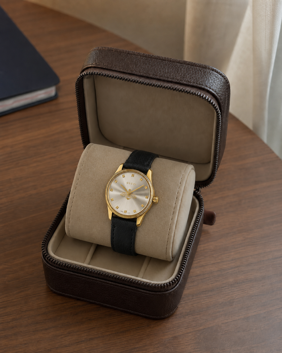 Gucci G-Timeless 29 mm Silver Bee Dial Watch YA1265023 presented in a luxury travel flat lay