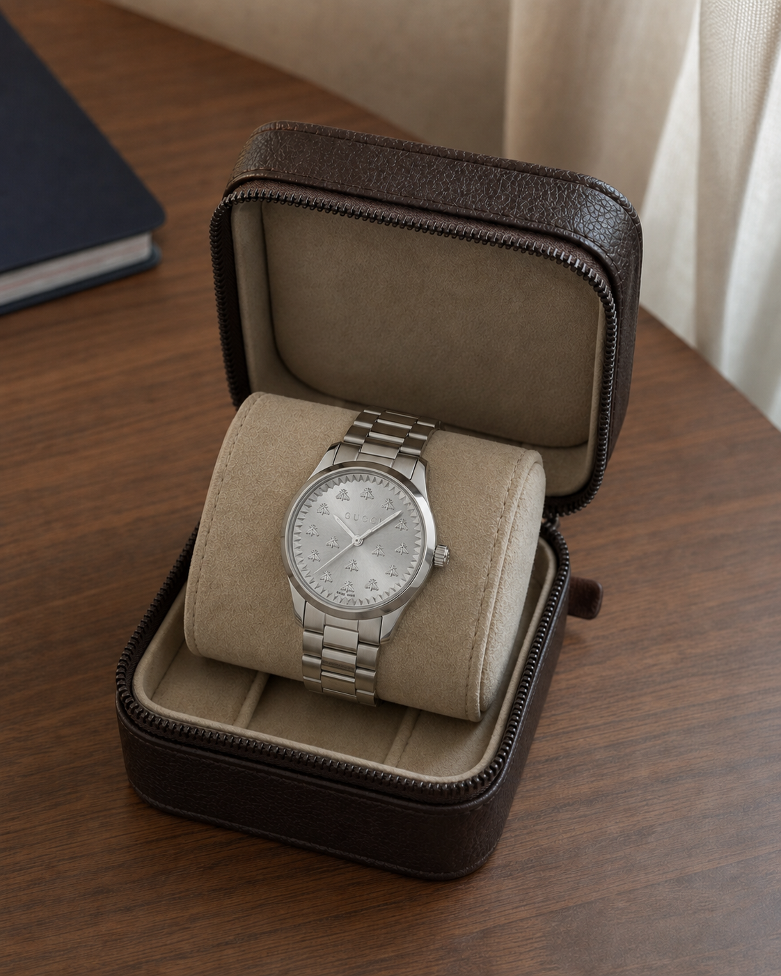 Gucci G-Timeless 32 mm Silver Bee Dial Watch YA1265031 presented in a luxury travel flat lay