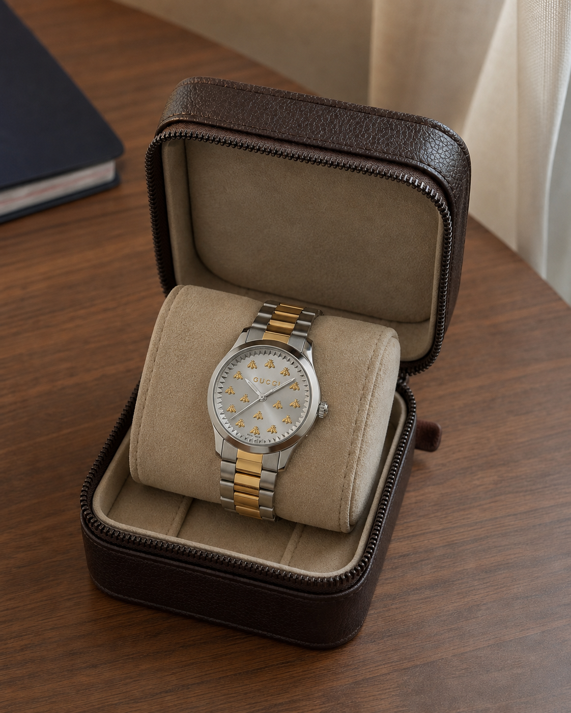 Gucci G-Timeless 32 mm Gold Bee Dial Watch YA1265032 presented in a luxury travel flat lay