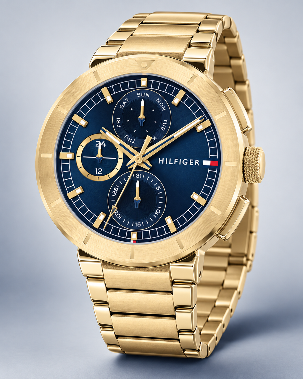 Tommy Hilfiger Lorenzo Men's Multifunction Watch – Navy Dial, Gold Steel Bracelet, 44mm – 1792118 – three-quarter profile