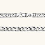 Polished 316L stainless steel Cuban link chain necklace, 9.6mm wide, with Greek key lobster clasp, silver tone.