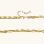 18K gold-plated twisted double herringbone snake chain necklace with lobster clasp and extender on white background.