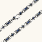 Oxidized silver 316L stainless steel chain necklace with rectangular navy CZ links and ornate gothic connector pieces, 640mm.