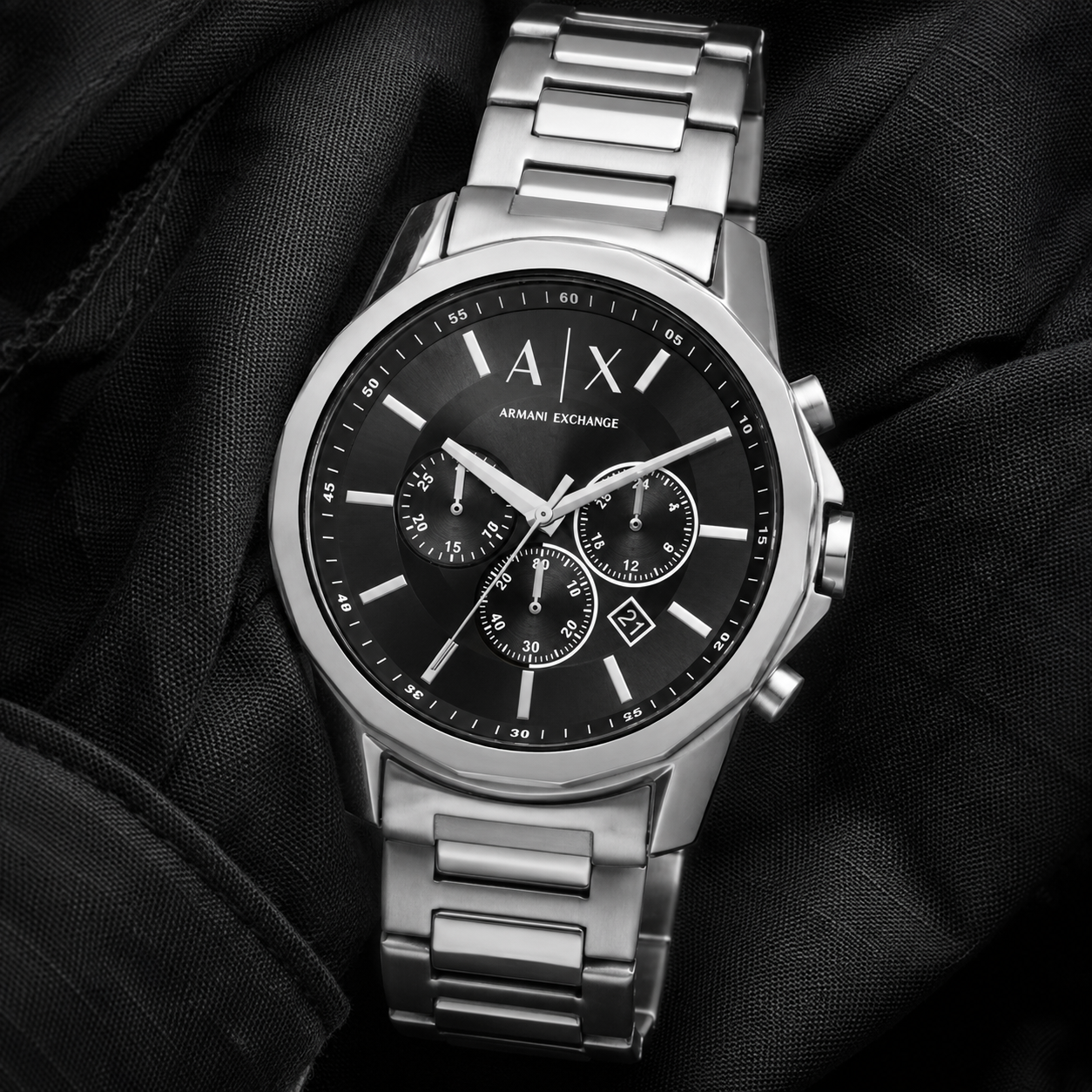 Armani Exchange AX1720 men's watch on black fabric