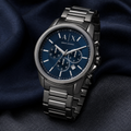 Armani Exchange AX1731 men's watch on navy fabric
