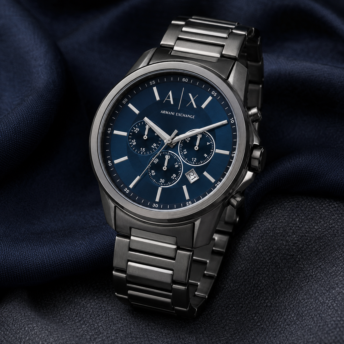 Armani Exchange AX1731 men's watch on navy fabric