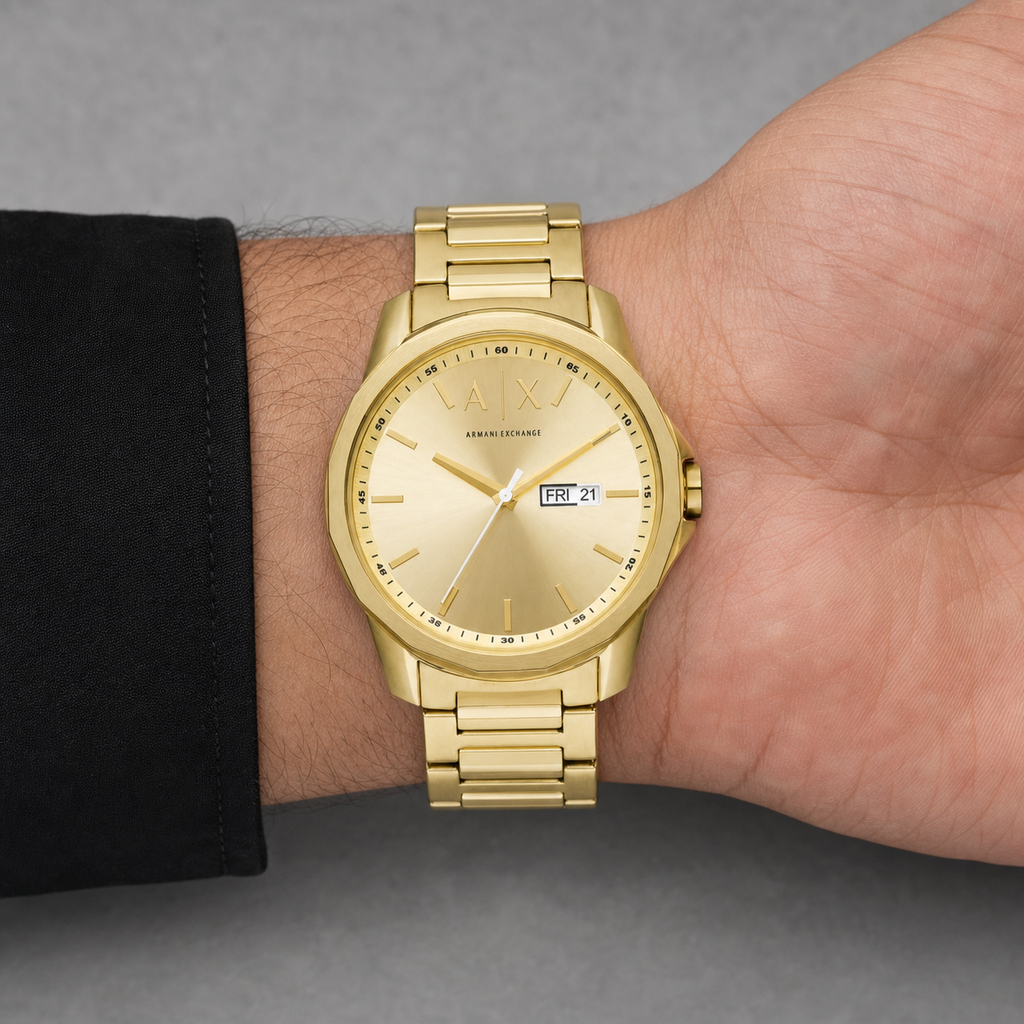 Armani Exchange AX1734 men's gold-tone day-date watch worn on inner wrist