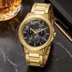 Armani Exchange AX1737 men's gold-tone marble dial multifunction watch desk scene