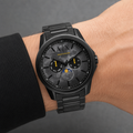 Armani Exchange AX1738 men's black multifunction watch worn on inner wrist