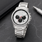 Armani Exchange AX1742 silver chronograph watch desk scene