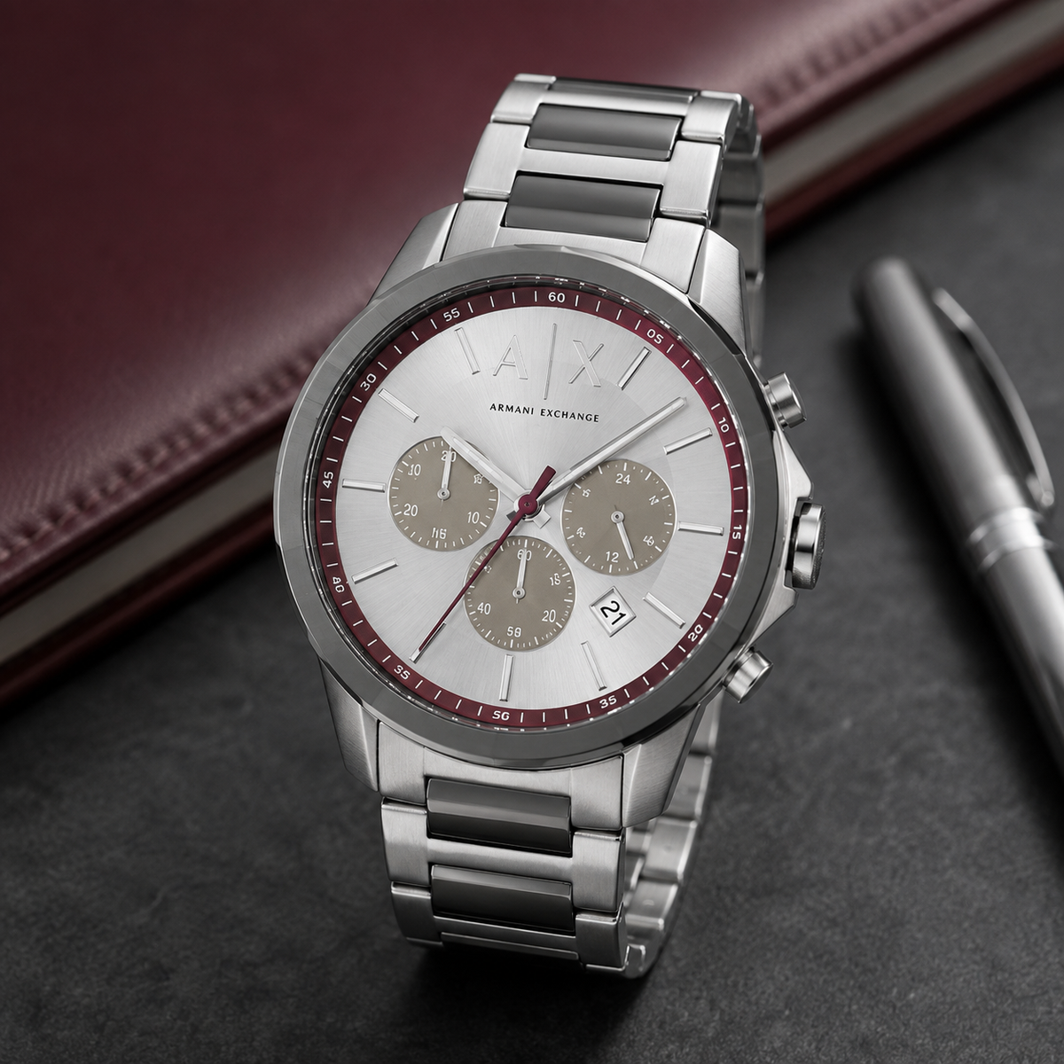 Armani Exchange AX1745 burgundy silver chronograph desk scene