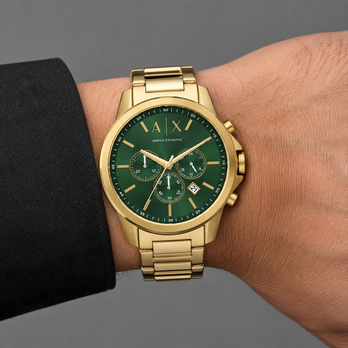 Armani Exchange AX1746 gold green chronograph worn on inner wrist