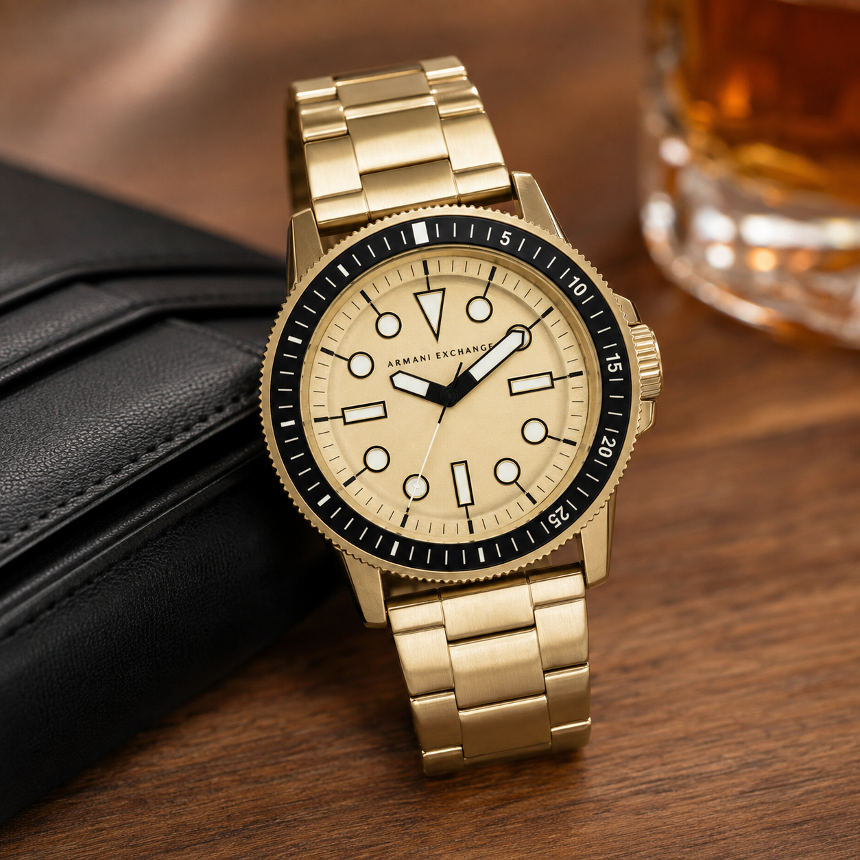 AX1854 men's gold-tone dive-style watch modern desk lifestyle view