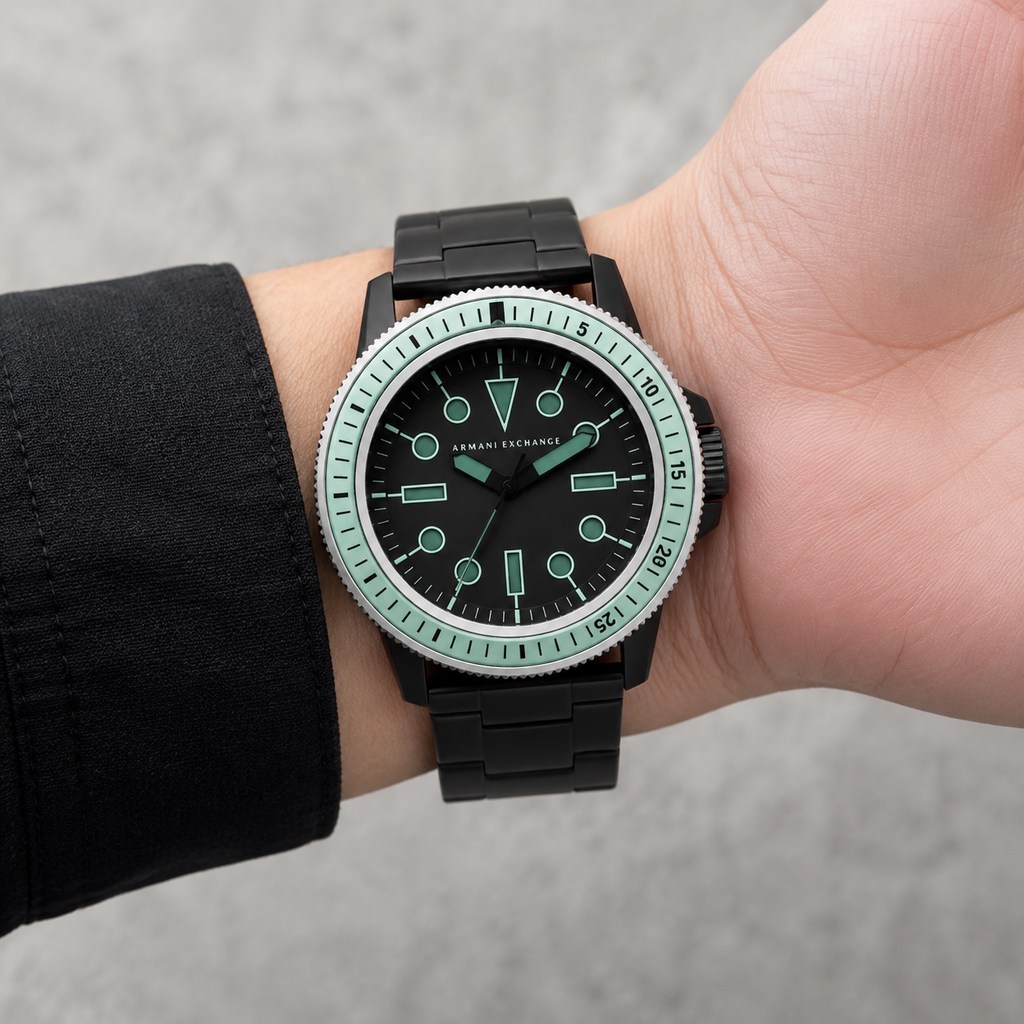 AX1858 men's black and mint dive-style watch worn on the inner wrist