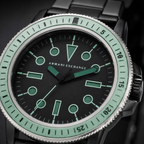 AX1858 men's black and mint dive-style watch dial macro detail
