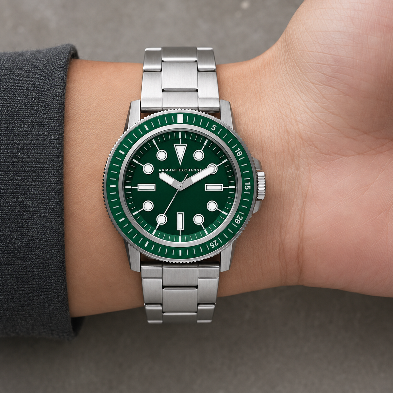 AX1860 men's silver and green dive-style watch worn on the inner wrist