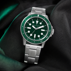 AX1860 men's silver and green dive-style watch editorial lifestyle view