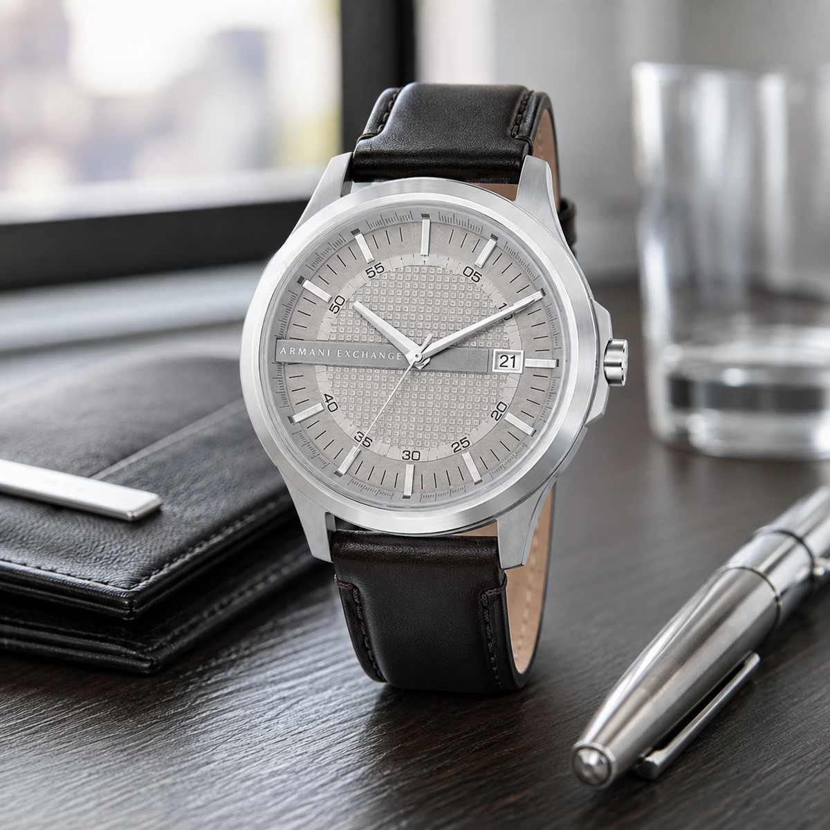 AX1867 men's silver textured-dial leather watch desk view