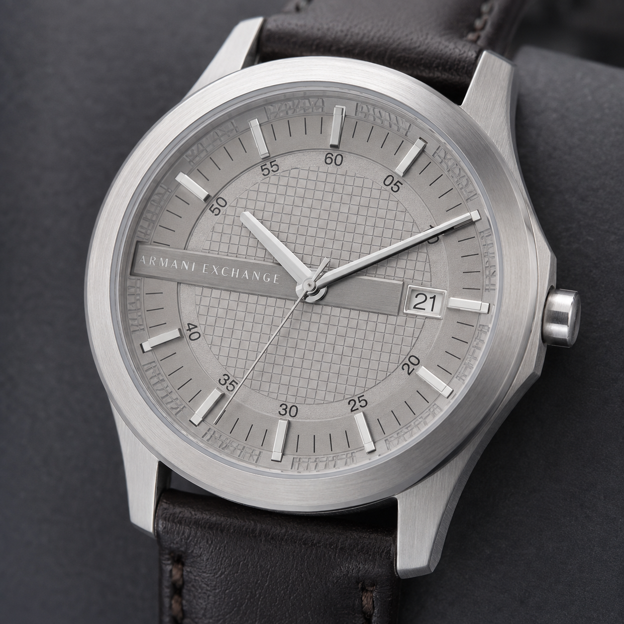 AX1867 men's silver textured-dial leather watch macro detail