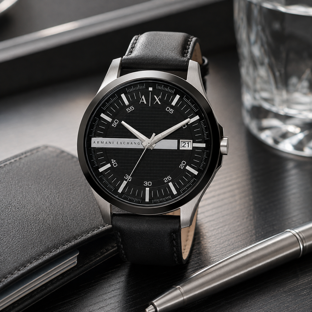 AX1870 men's black dial leather watch desk view