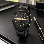 Armani Exchange AX2133 black and gold-tone chronograph desk view