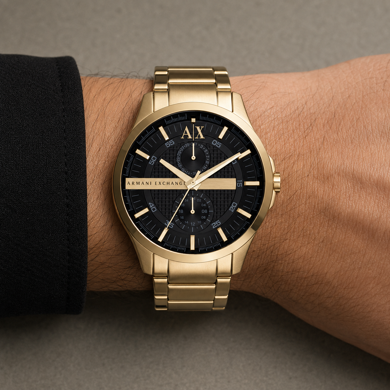 Armani Exchange AX2135 men's gold-tone watch on wrist