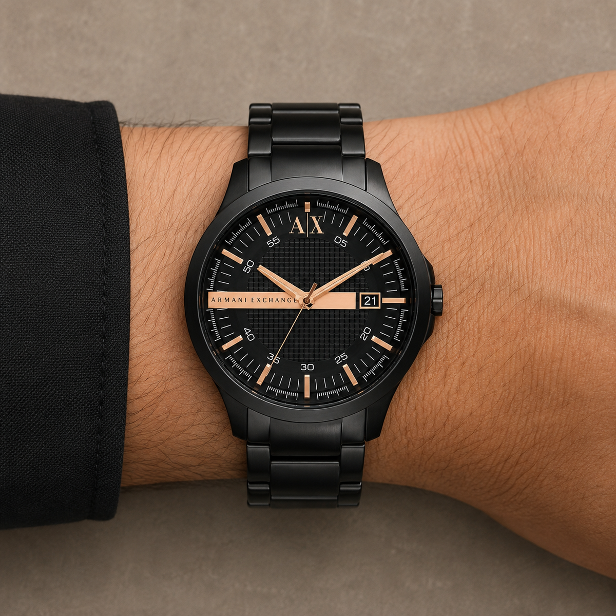 Armani Exchange AX2152 men's black and rose-gold-tone watch on wrist