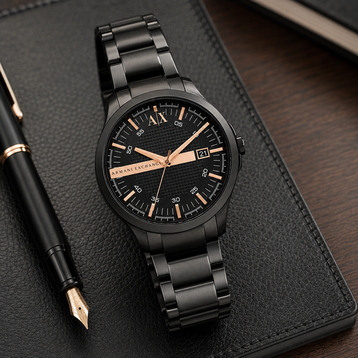 Armani Exchange AX2152 black and rose-gold-tone watch desk view