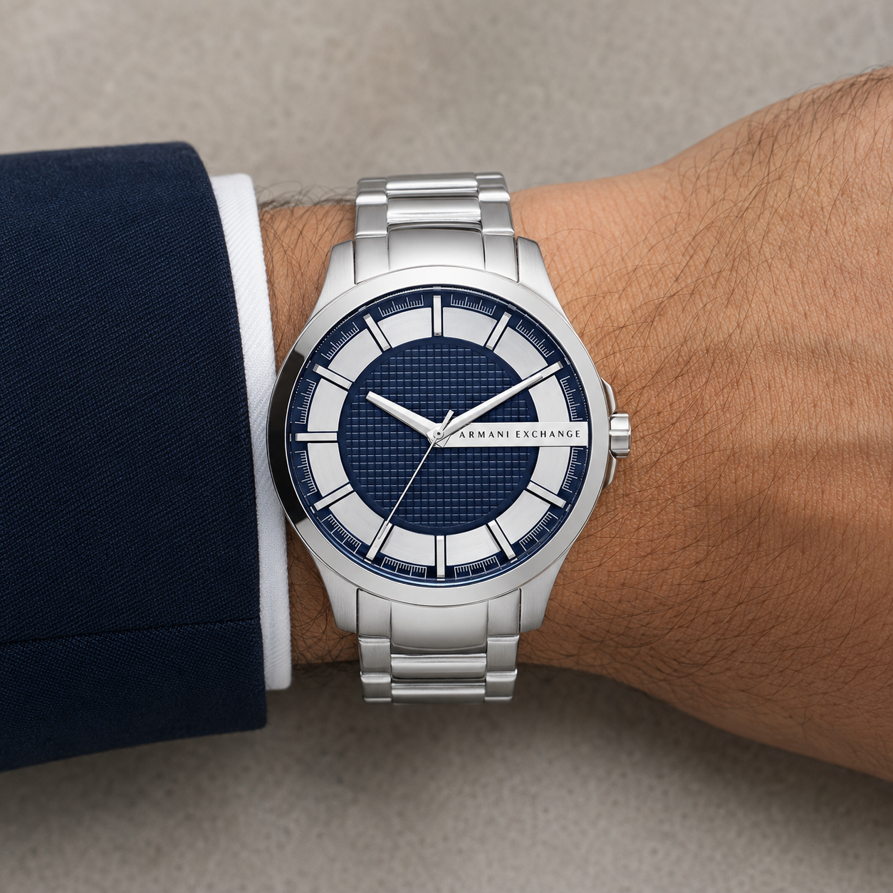 Armani Exchange AX2164 men's silver watch with navy dial on wrist