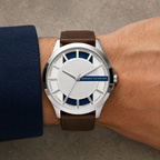 Armani Exchange AX2172 men's silver white and navy watch with brown leather strap on wrist