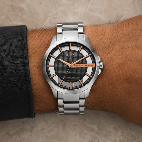 Armani Exchange AX2199 men's silver and rose gold watch on wrist