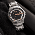 Armani Exchange AX2199 men's silver and rose gold watch lifestyle view