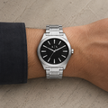 Armani Exchange AX2320 men's silver watch on wrist