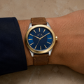 Armani Exchange AX2334 men's brown leather watch on wrist