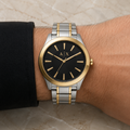 Armani Exchange AX2336 men's two-tone black watch on wrist